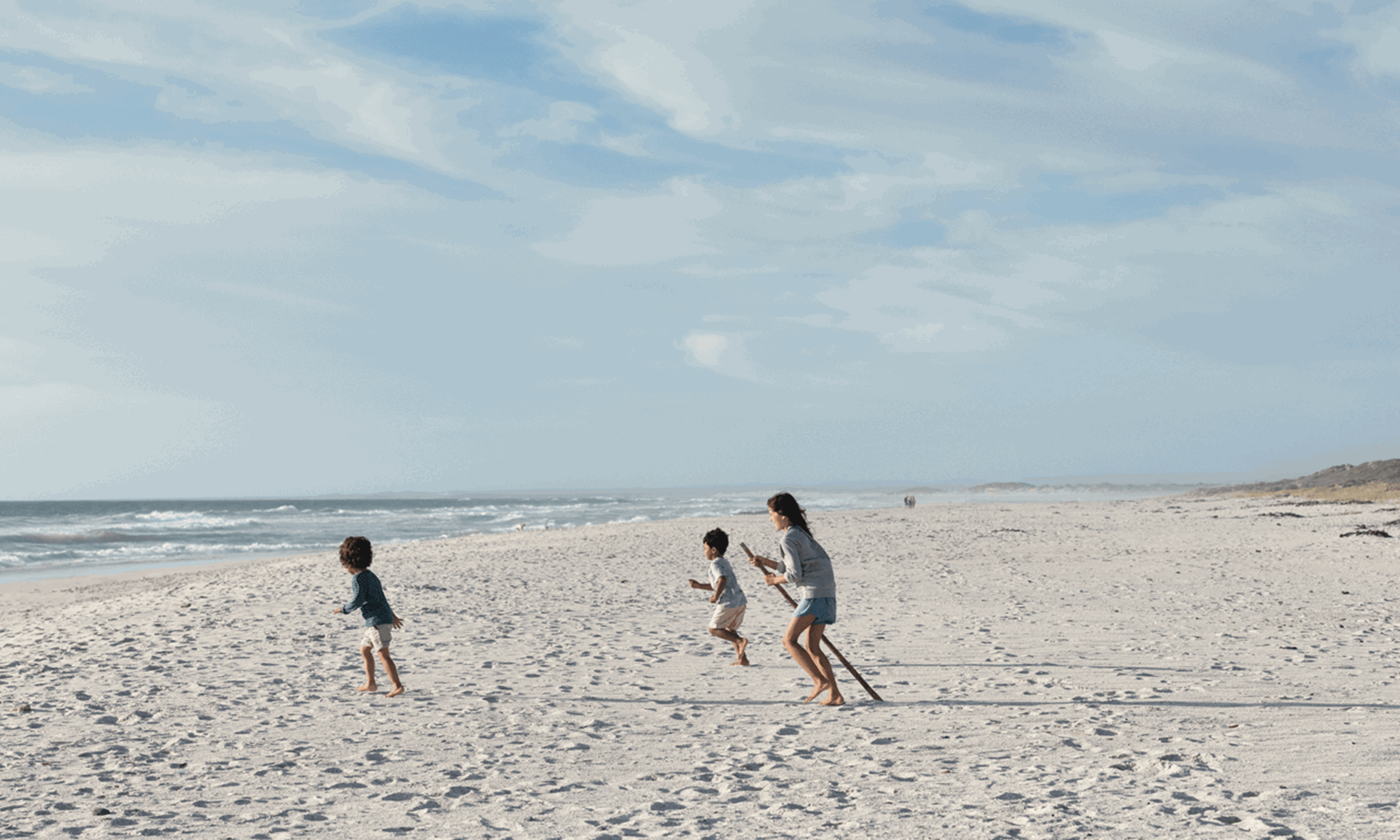 Kinderen rennen op strand | Vattenfall Energie