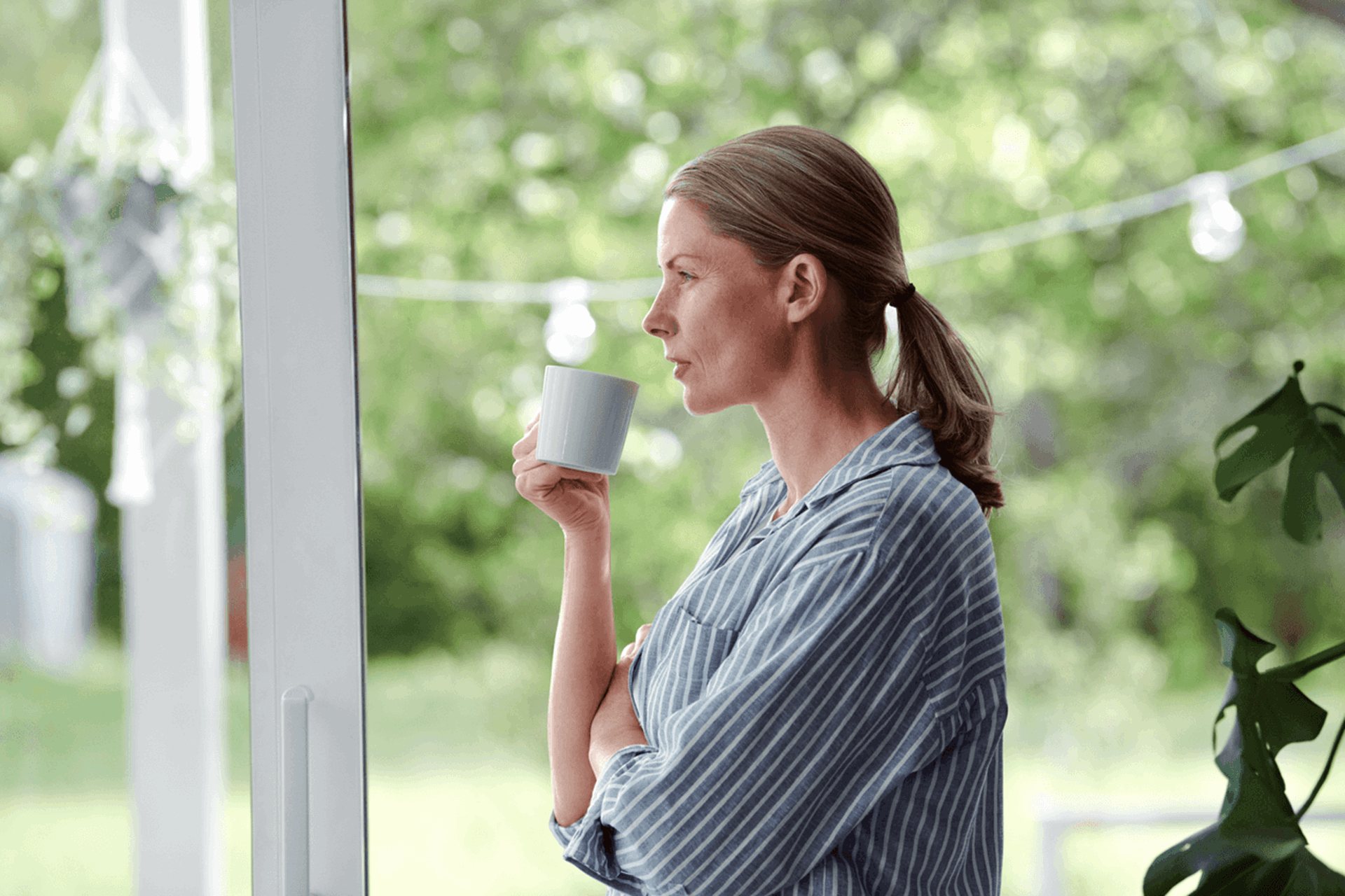 Vrouw met kop koffie | Vattenfall